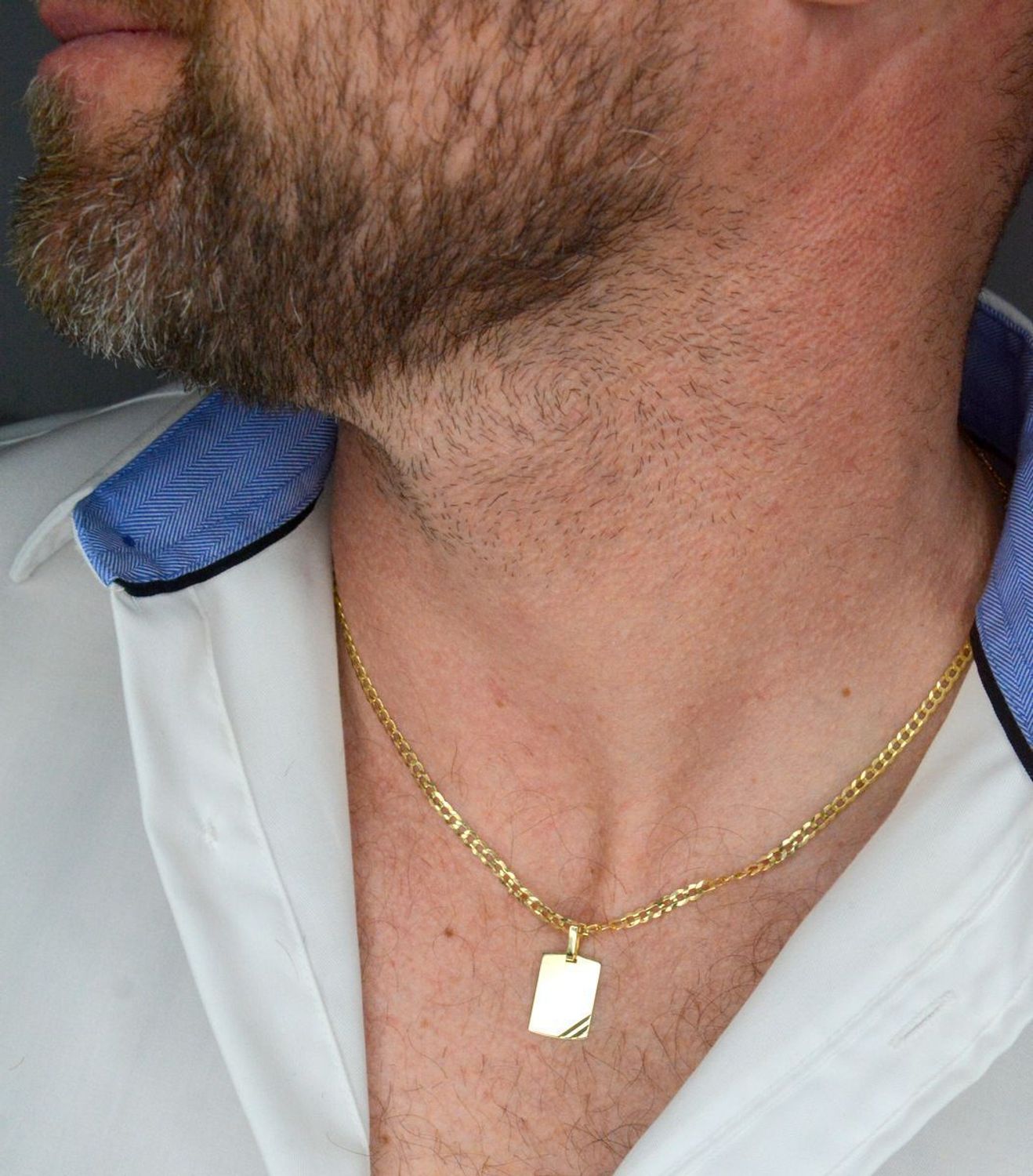 Złota zawieszka 375 gładka blaszka nieśmiertelnik ZA 6359B 375 Wisiorek został wykonany z wysokiej jakości złota próby 375. Złoto to jeden z najpopularniejszych kruszców, cenione przez kobiety na całym świecie1.jpg